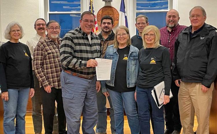 Members of Lampasas Friends of the Night Sky gather with the Lampasas City Council for a photo to celebrate the resolution proclaiming February as Night Sky Awareness Month. courtesy photo | friends of the niight sky