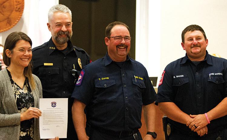First Responders Day was recognized by the Lampasas City Council at its meeting Monday night. On hand for the presentation from interim city manager Erin Corbell are, from left, Lampasas Chief of Police Jody Cummings, Lampasas Fire Chief Tim Davis and Lampasas Fire Marshal Bart Baker. hunter king | dispatch record