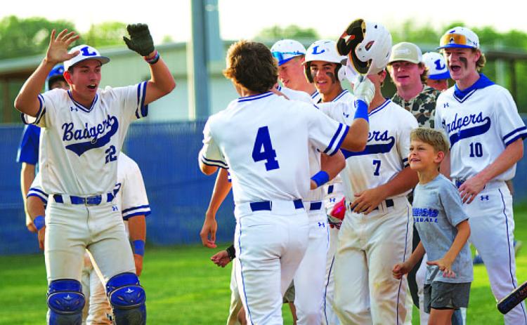 HUNTER KING | DISPATCH RECORD The team celebrates Timber Gholson’s home run against Salado last Thursday night.