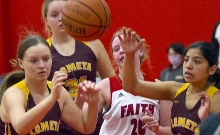 Shyanne Tower (14), Sierra Tower (31) and Emily Andrade (far right) go for a defensive rebound in a 63-20 victory at Marble Falls Faith Academy. JEFF LOWE | DISPATCH RECORD